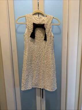 Girls Ivory Sequin Dress with Black Bow